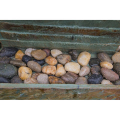 Natural Stone Floor Fountain with Light Rectangular Base Supports The water Wall, with River Stones Resting on The Bottom