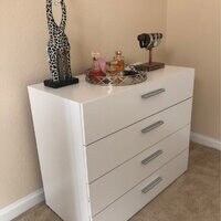 White 4 Drawer 31.57'' W Dresser The Four Drawers Sit on Ball Bearing Glides and Plenty of Spare Storage Space