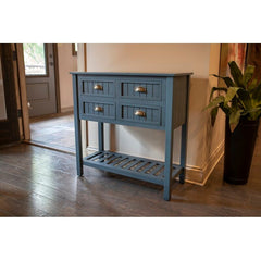 Console Table  Curated Displays of Family Photos, Potted Plants, and More Four Paneled Drawers with Cup Pulls and Boasts A Solid Color