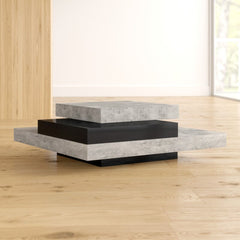 Concrete/Pure Black Akrati Coffee Table Supports up to 33 lbs. Fusing Function and Sculptural Style