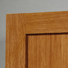 Highland Oak Elborough Armoire Cabinet Strikes a Tall Rectangular Silhouette